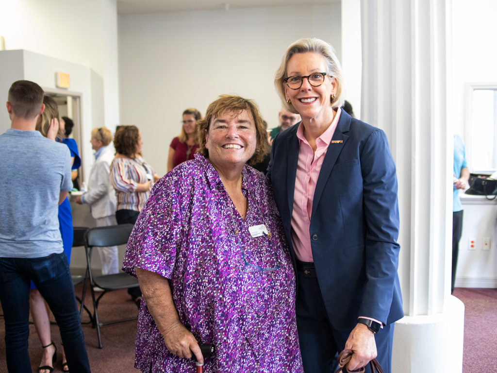 Lorraine Langlois of METRO Inclusive Health and Mayor Jane Castor of Tampa smiling for a picture